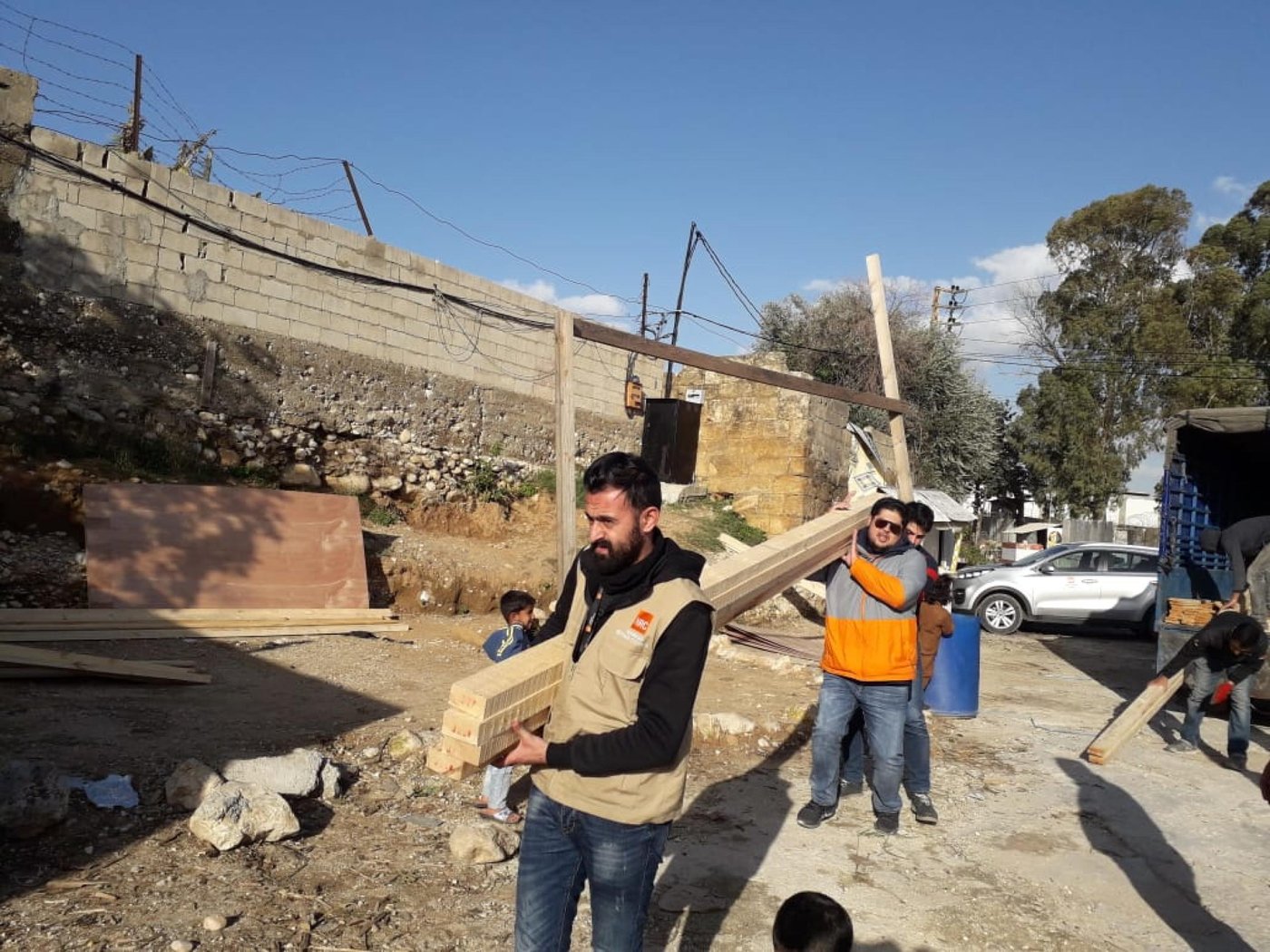 This winter, many families lost their tents, their temporary home. Mohammad, one of the refugees living in an informal tented settlement in South Lebanon was telling NRC how the stream had a devastating effect on his tent. “I lost everything, my personal belongings, my mattresses, the latrine, my water tank… I lost the one place I called home for the past two years.”
The NRC’s Shelter, WASH and ICLA teams were present in the field to assess the needs of the Syrian refugees in three informal tents settlements in South Lebanon. These sites were flooded and the tents were damaged. Families were not able to sleep; they had to leave their shelter.
the NRC field teams were active on the ground to distribute core relief items: shelter kits (mainly wooden timbers and tarpaulin), blankets and mattresses.
The legal team also provided counselling to affected refugees who lost their civil documents during the storm.
Photo: Ali Ibrahim/NRC