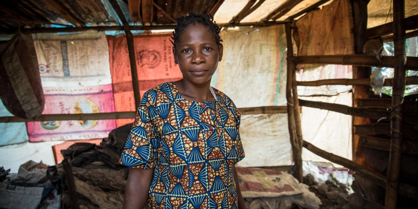 Minette (38) and her family fled from Manyu and sought safety in Buea after their home was burned down. They have received some plastic sheeting and utensils from NRC, and they have built a temporary kitchen at their new place in Buea.

Photo: NRC/Tiril Skarstein