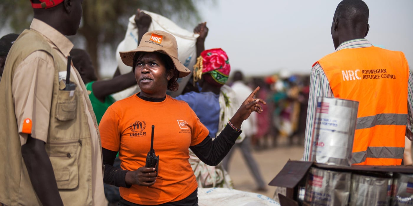 NRC staff coordinating food distribution to more than 7000 displaced, together with local leaders in Ngop, South Sudan.