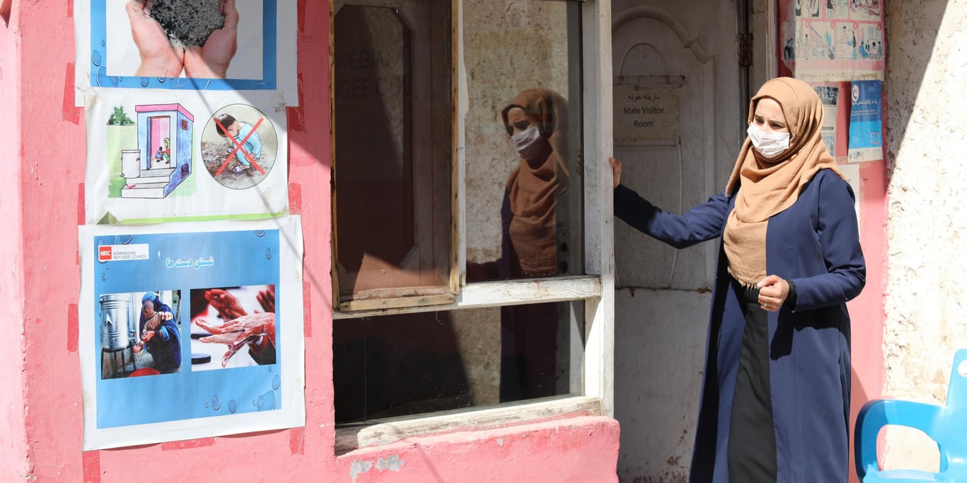 Inside NRC camp management center in the outskirts of Kabul city, our staff provides masks to visitors from the camp and also guide them on prevention measures and train them how can they reduce any potential risk of infection to them and their family. 

NRC Camp Management is working in 20 settlements consist of 4000 households and 35000 individuals, out of  52  informal settlements in Kabul. Photo: Enayatullah Azad / NRC