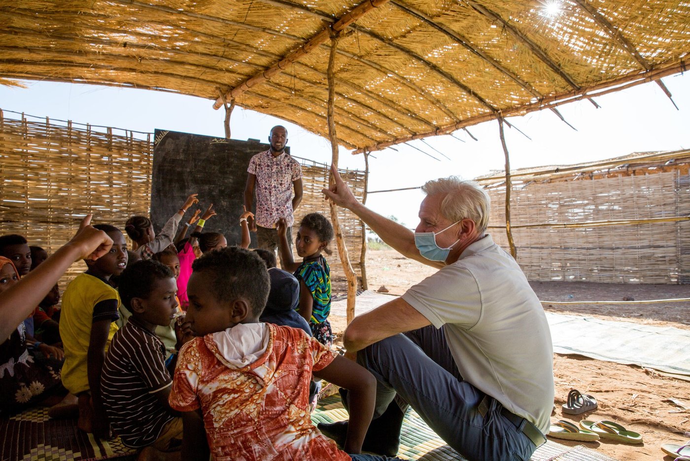 Education has resumed! Jan Egeland is joining the children in their class. 

In a week, the team erected school structures that can host 700 children in two shifts. The teachers are themselves refugees that now can teach again. 

Photo: Ingebjørg Kårstad/NRC