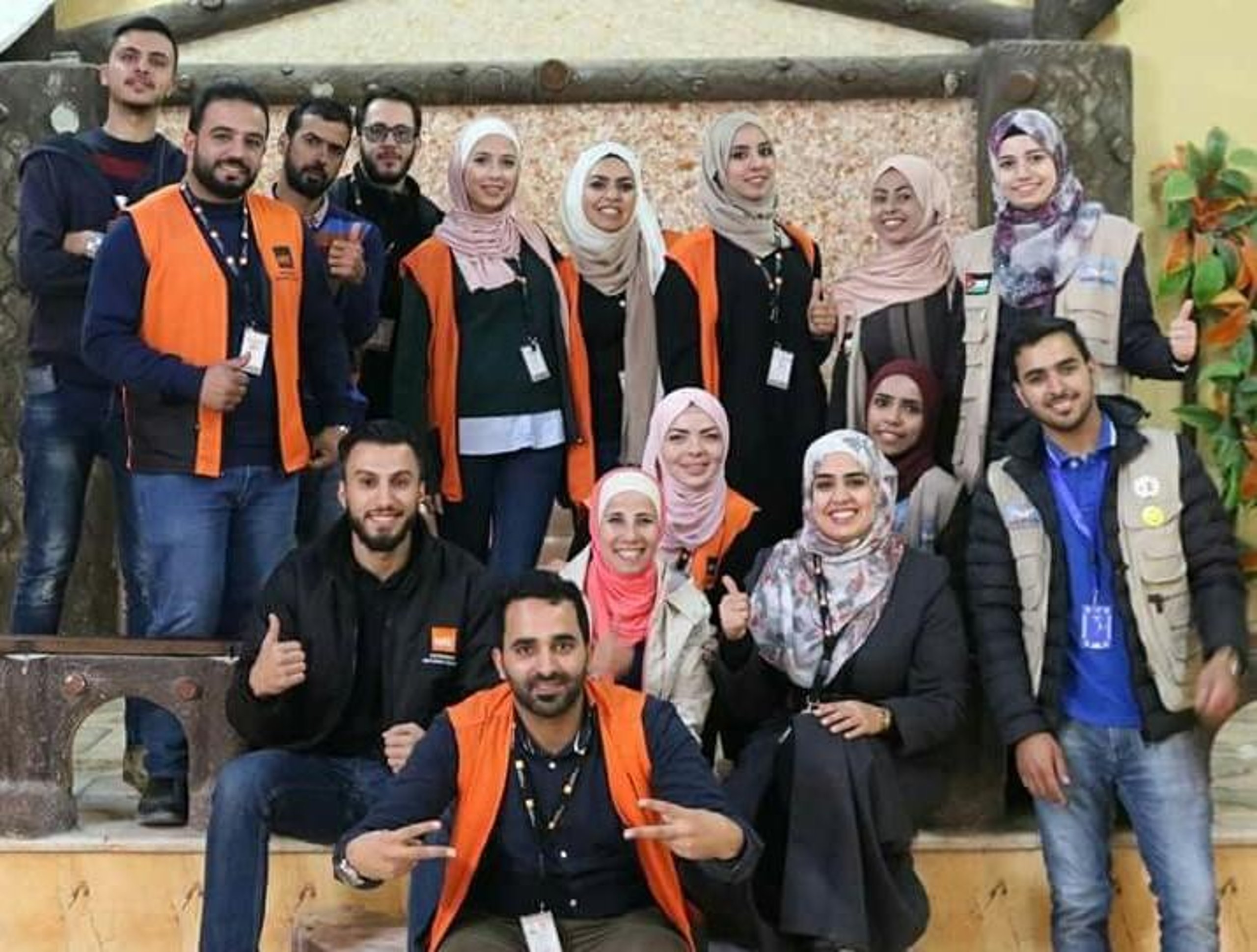 The Mafraq ICLA team organise monthly theatre events to deliver legal information. Here the team is together with the volunteers that help write the play.