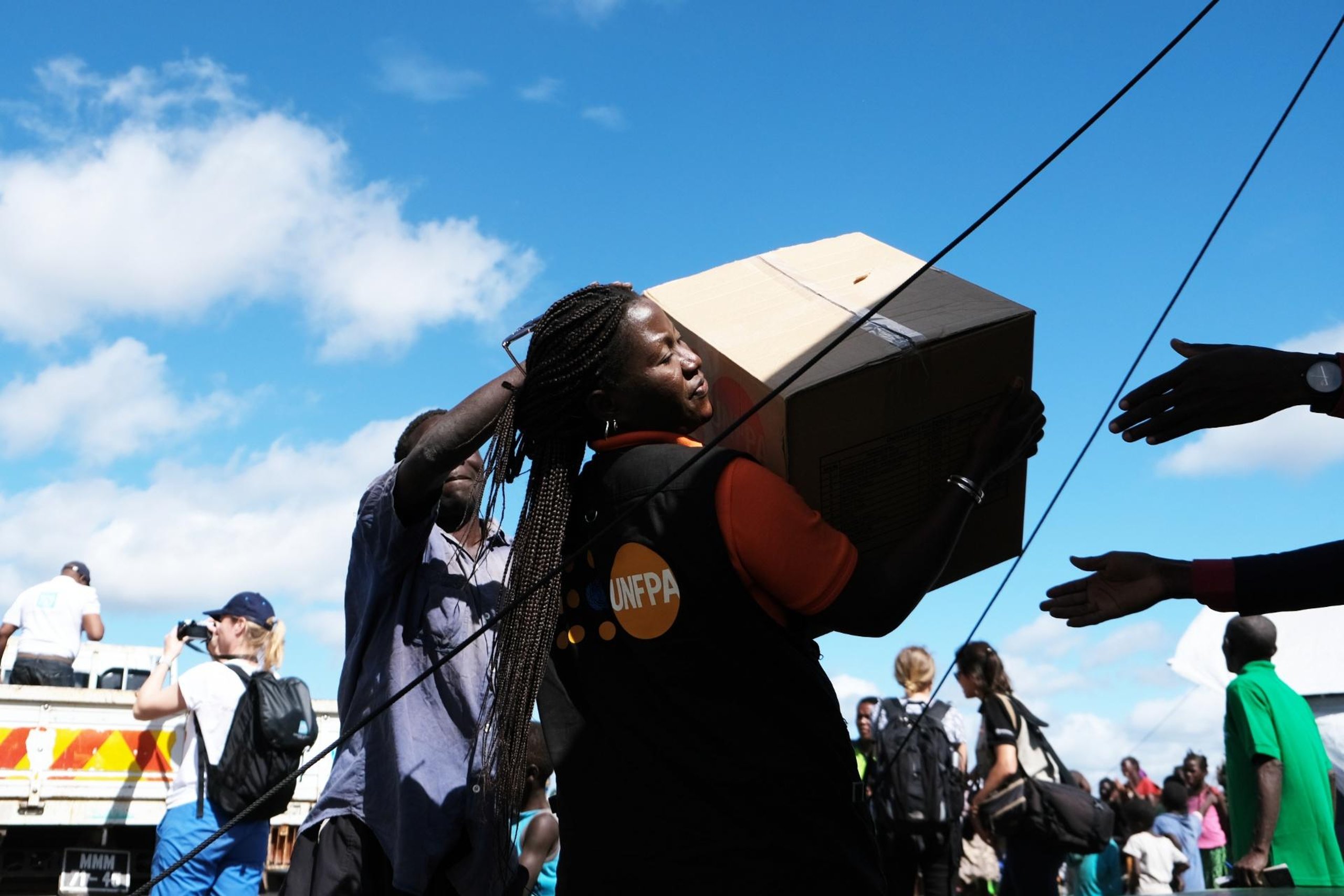 NORCAP expert Sabine and colleagues distributing dignity kits in Mozambique.