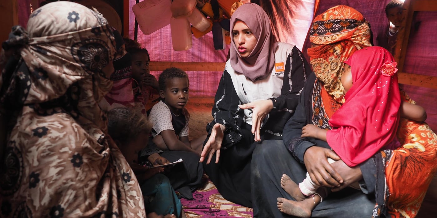 NRC provides birth certificates to children in camps. Part of the work is explaining the importance of legal documents.