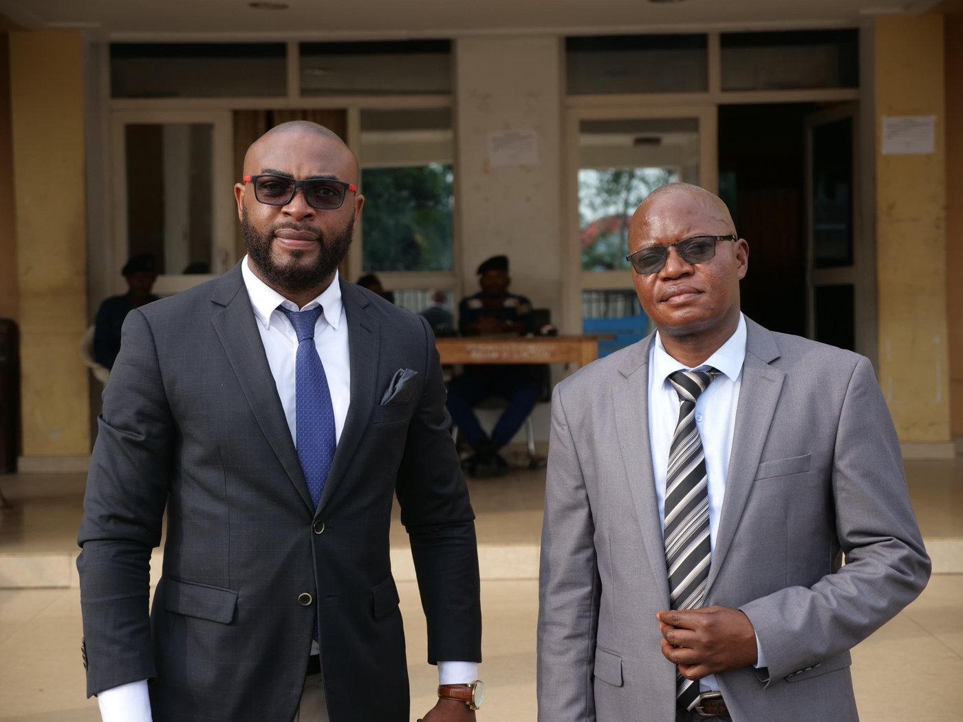 Bob Kayombo Nyoka and Stephane Muanda Malombo and, both members of parliament, pose in front of the Kasai Central Provincial Assembly.
We are working with parliamentarians in Kasai Central, DRC. Our information counselling and legal assistance (ICLA) team is making efforts to introduce legislation that will get to the root of some of the causes of violent land conflicts in the province.
Photo: Itunu Kuku/NRC