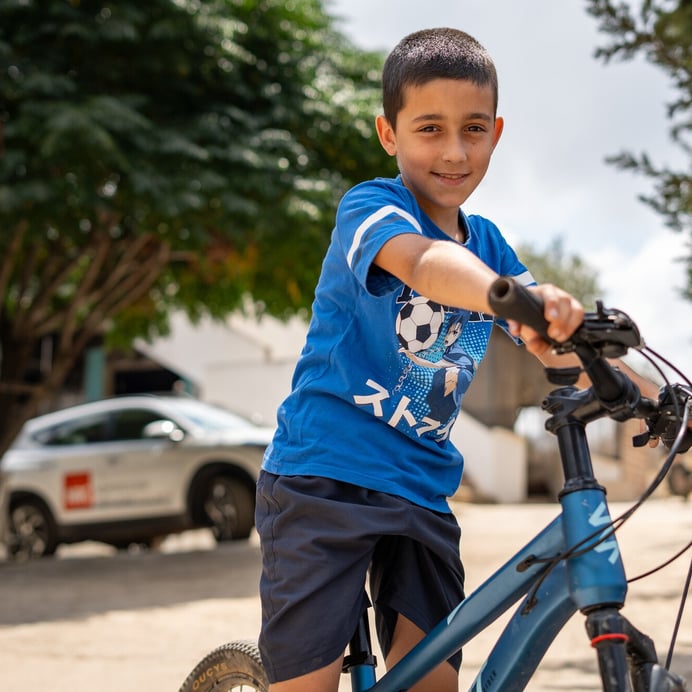 Louis, 9, can play with his friends in the village again. Photo: Tina Abu-Hanna/168极速赛车官方彩票结果查询网®NRC