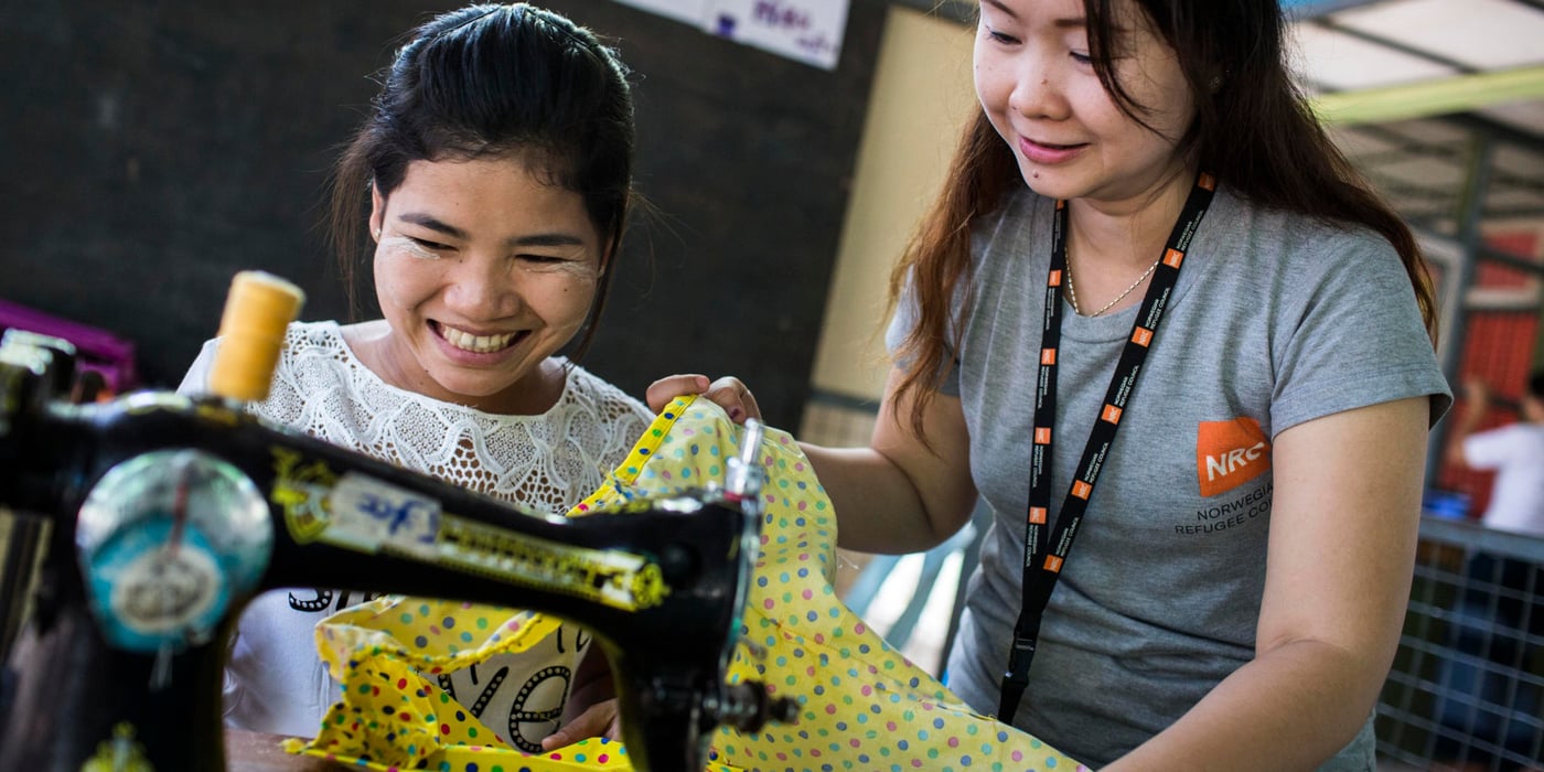 Under guidance of skilful NRC employees, students learn how to tailor at a Youth Education Programme Centre in Myanmar.